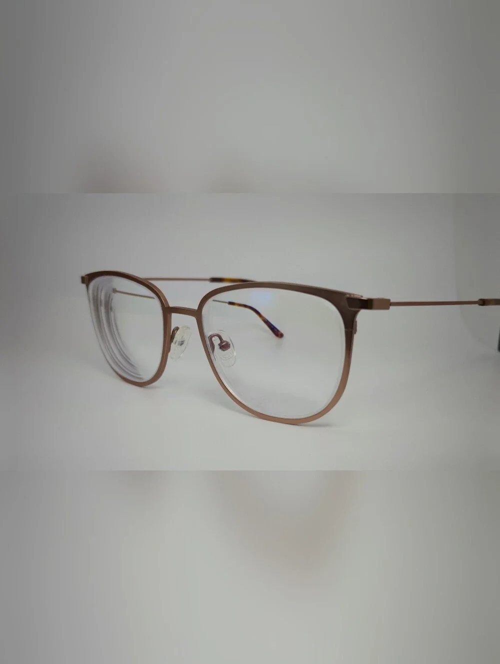 Vita. Metal Frame Eyeglasses in Copper Brown. Tortoise Temple Tips.
